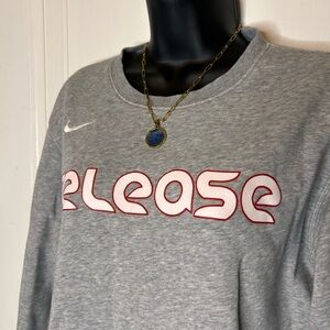 “Release” Nike Gray Sweatshirt with Red Accents
